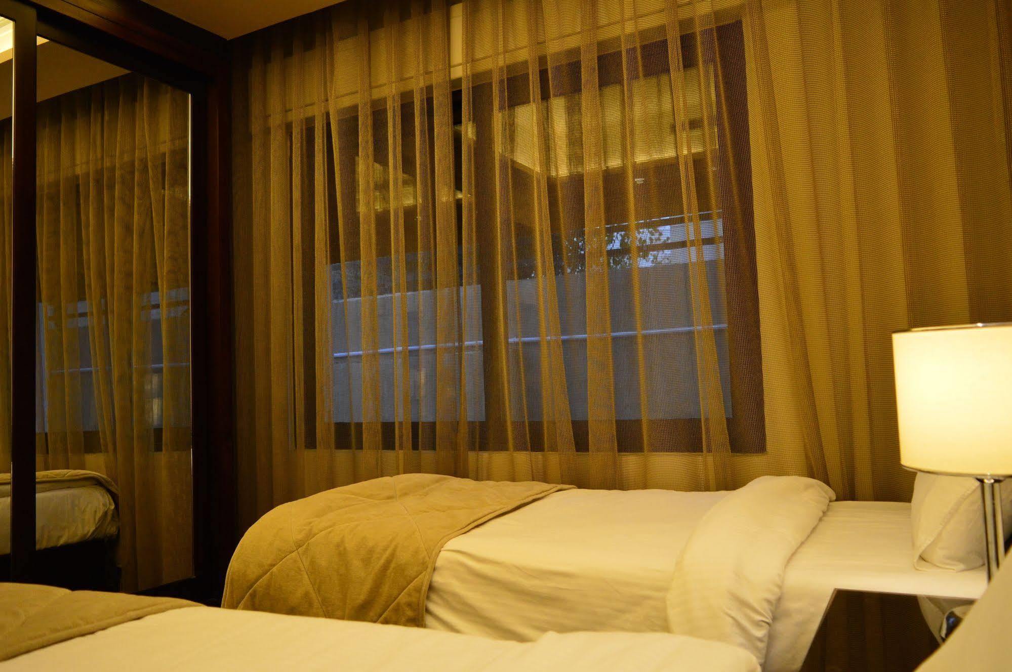 Nadine Hotel Suites Аман Екстериор снимка